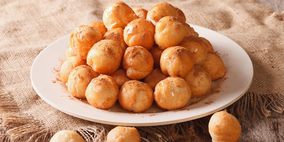 Λουκουμάδες πακιστανικοί με φρέσκο βούτυρο, μέλι  και αποξηραμένα φρούτα